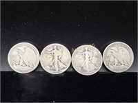 FOUR U.S. WALKING LIBERTY HALF DOLLARS