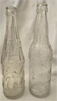 Lot of 2 vintage clear bottles from Biloxi MS