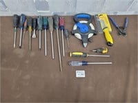 Screw drivers, tape measure, and more tools
