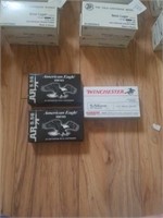 Pair of centerfire ammo and 1 5.56mm 55 grain