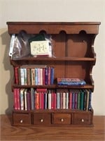 Selection of Mini Books in Wood Shelf