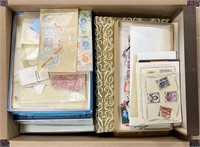 Worldwide and US Stamps on and off paper in mix of