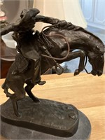 Bronco buster bronze statue, Frederick  Remington