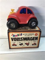 Vintage battery-operated tumble Volkswagen car