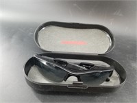 Pair of Carrera sunglasses in case