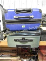 GROUP OF USED SUIT CASES