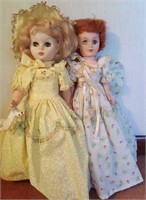 Two vintage dolls one on stand, need cleaning