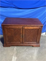 Wood entertainment center, dimensions are 45 x 25