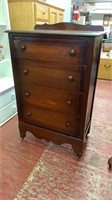 Antique chest of drawers on wooden casters  27” x
