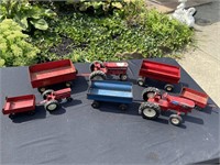 Toy farm tractors and trailers