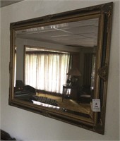 Gorgeous black and gold framed mirror