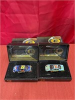 Two 1:64 scale NASCAR Elite cars