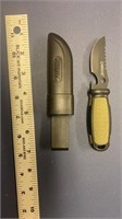F1) CAMILLUS utility knife.Has bottle opener.Snaps