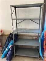 Metal shelves and many bag chairs