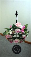 Floral arrangement and metal shelf