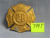 Antique F.D. hat badge