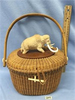 Unusual, handmade Nantucket basket; has an ivory c