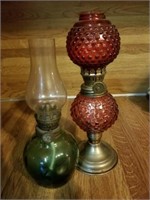 2 SMALL OIL LAMPS-- 1 PINK DOUBLE GLOBE AND 1 GREE