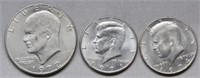 Eisenhower Dollar and (2) Kennedy Half Dollars.