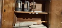 CABINET FULL, ROLLINGPINS AND DRINKING MUGS