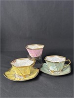Lot of five Japanese Lustre ware Cups & Saucers