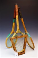Three vintage tennis rackets
