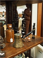 Collection of carved items: candlestands,