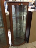 Lighted Corner curio cabinet w/curved glass door,