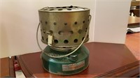 Gas camping heater.  Measures 9” height by 7.5”
