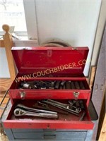 Red metal toolbox with contents