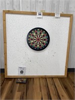 Dart board mounted on backing w/ darts
