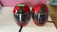2 matching motorcycle helmets
