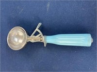 Vintage ice cream scoop with light, blue handle,