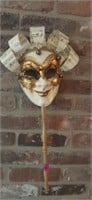 Opera mask on stick signed Olivia A.