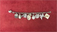 Sterling silver charm bracelet, w/ charms