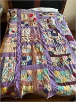 Machined colofoful quilt. Few snags Tears