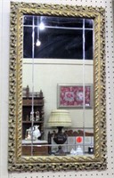Ornate Cast Mirror with Grooved Accents
