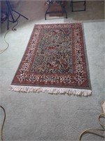 Beautiful hand knotted rug featuring animals