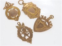 Four 9ct gold fobs