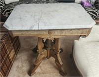 Beautiful wooden table with marble top cracked