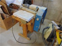 Large power feed sander. Works