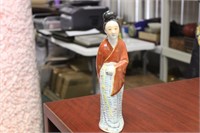 A Chinese Porcelain Figure of a Lady