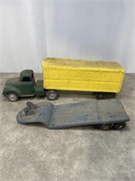Metal Tonka truck with Structo toy trailers