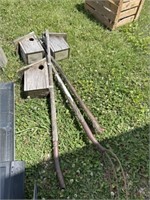 Pitchfork bird houses in rough shape