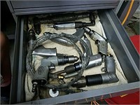 Drawer full of pneumatic tools including Snap-On