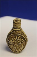 A Carved Resin Snuff Bottle