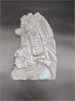 Carved stone figure