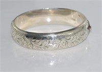 Hallmarked silver hand engraved oval bangle