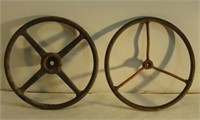 Two Antique Tractor Steering Wheels