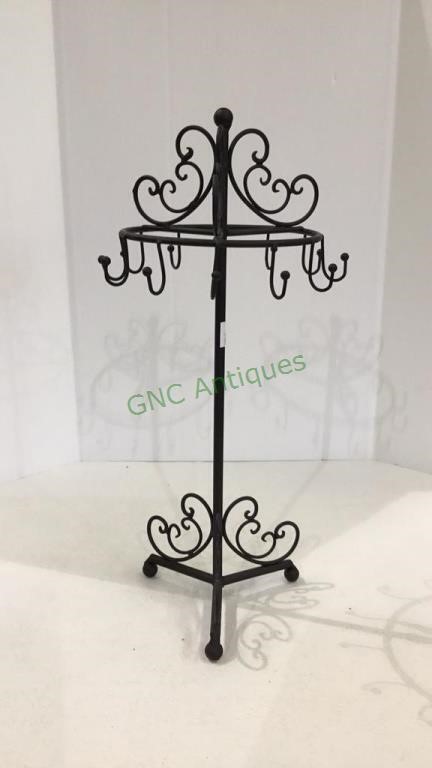 Metal necklace holder measuring 16 inches tall.